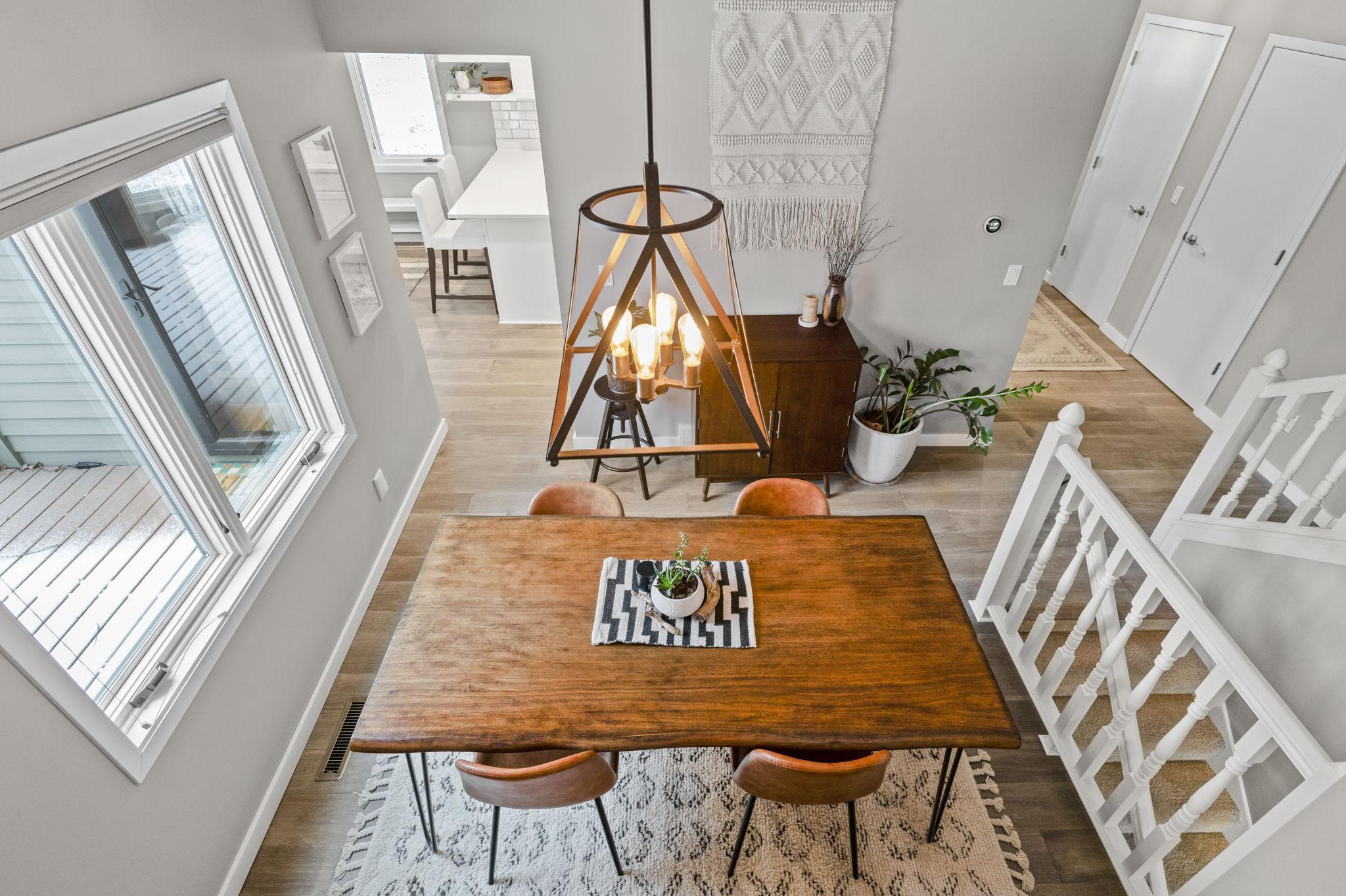 This is the view looking down from the upper level living room of the private dining area.