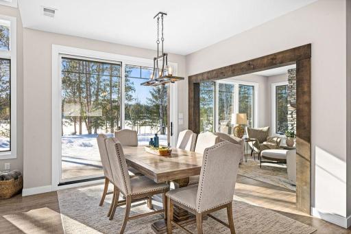 Dining area with large patio door, convenient for outdoor dining and entertaining!