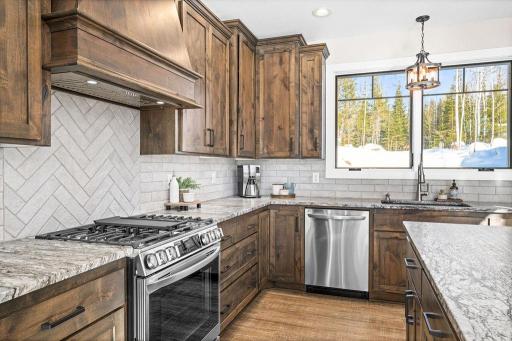 Stainless appliances,custom backsplash and leathered granite countertops!