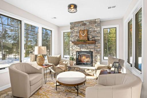 Gorgeous Sunroom with views on every side! Enjoy your morning coffee here or curl up with a good book!