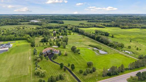 Portion of the 10 acres is on the West side of the home seen here and is buildable