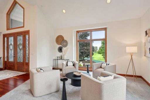 Formal living room off the front offers plush new carpet and plenty of room for gathering