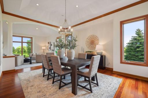formal dining room with cherry hardwood flooring
