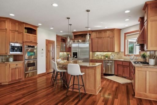 Main level offers brazillian cherry hardwood flooring