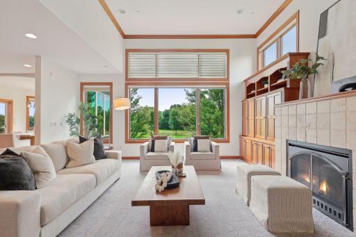 Oversized windows flooding this great room with natural light