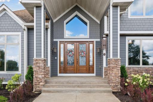 Welcoming double front entry with new concrete work