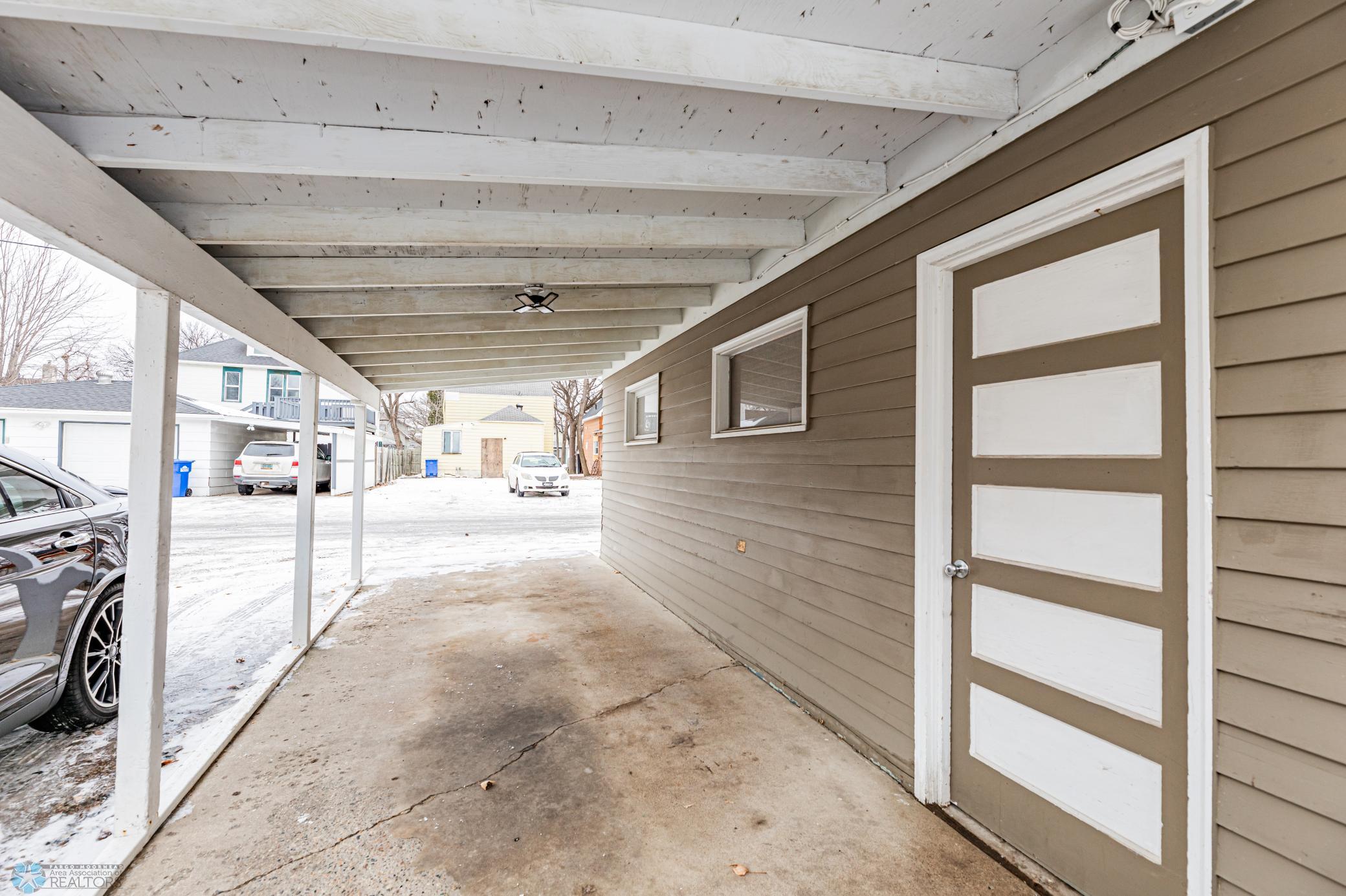 Carport with Concrete Drive