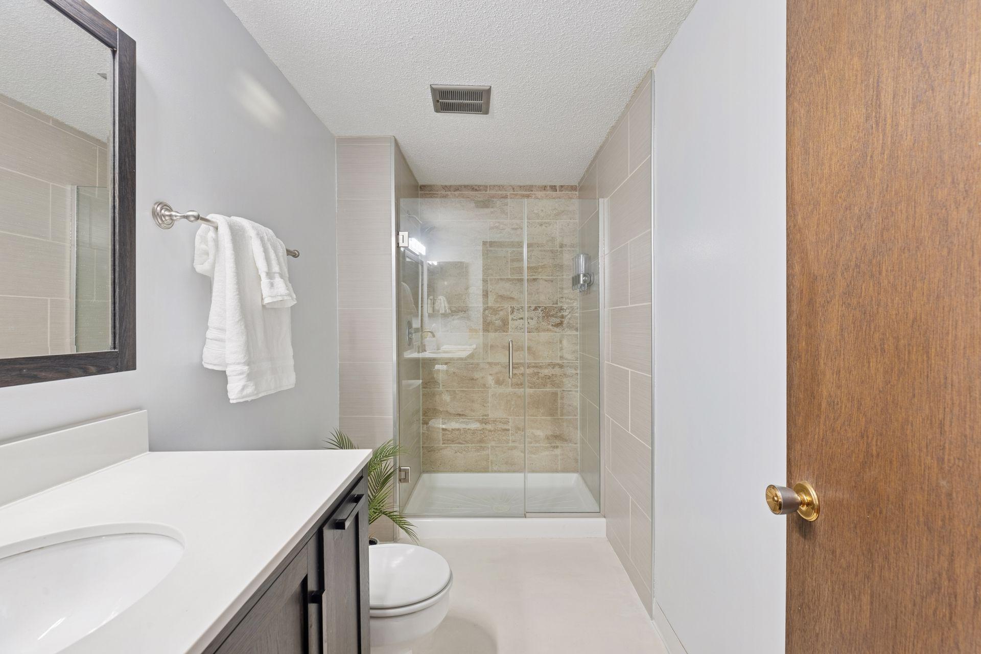 Beautiful glass doors and tilework.