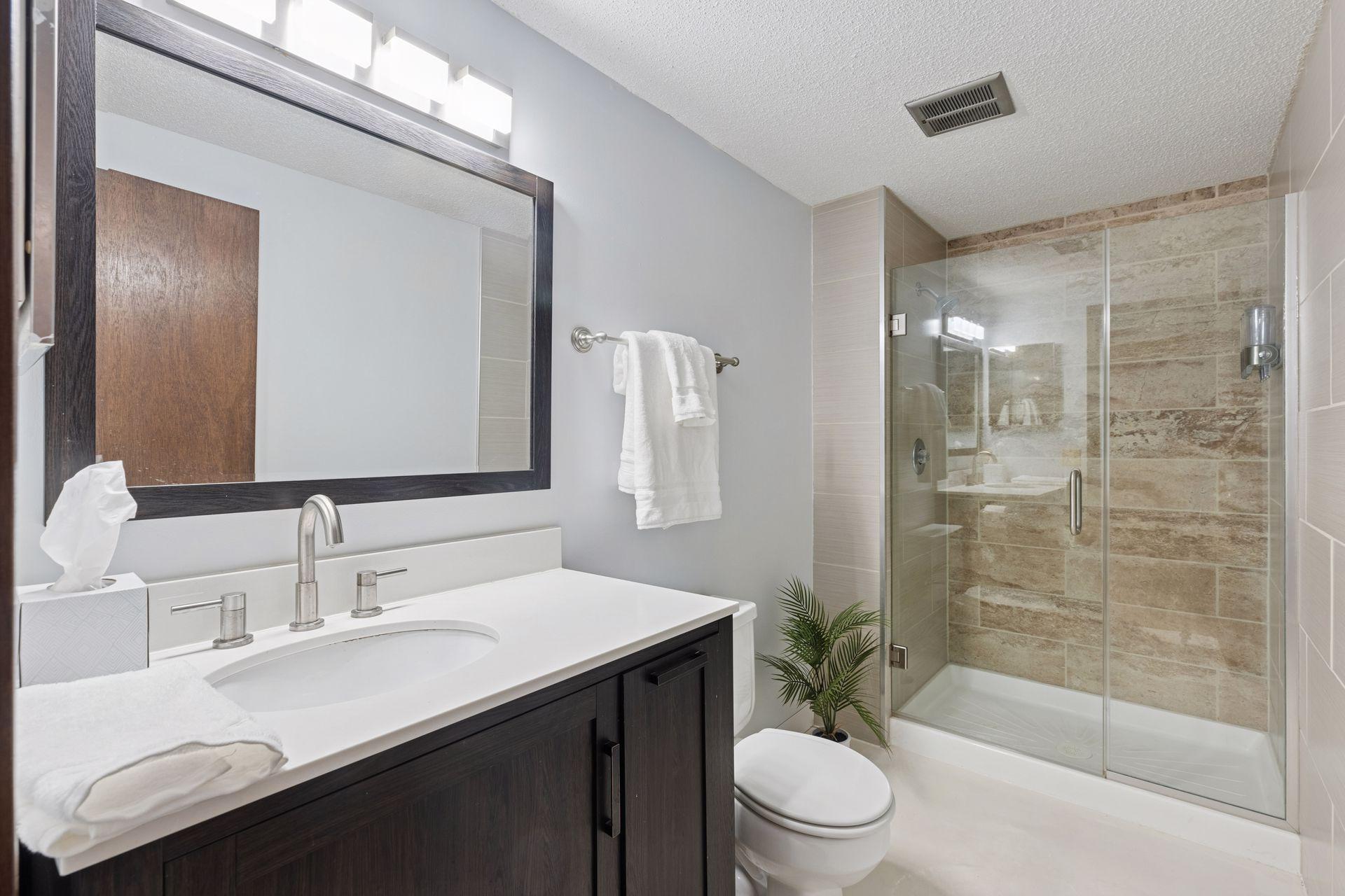 Lower level on-trend and updated 3/4 bathroom.