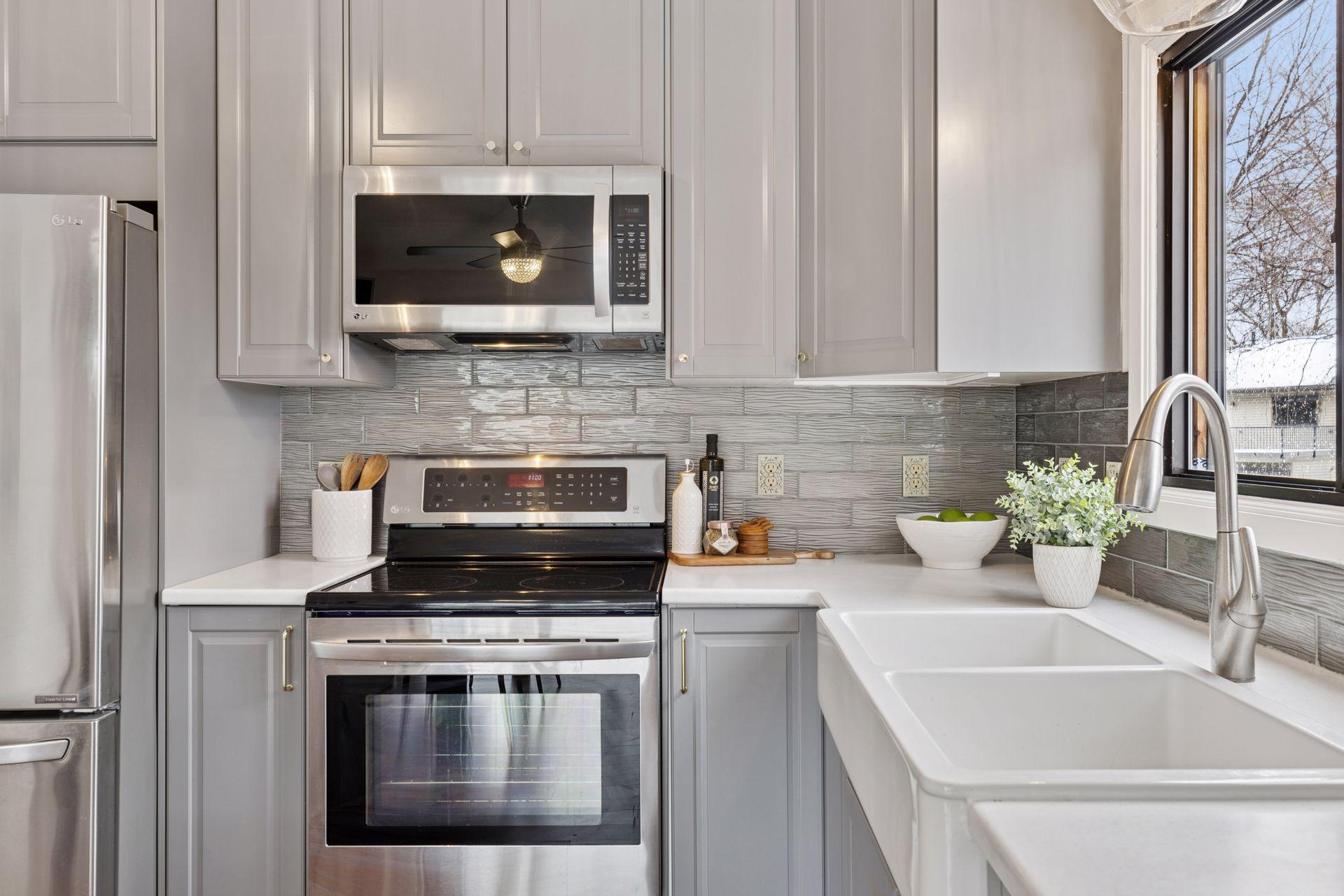 Lovely on-trend backsplash and countertops.