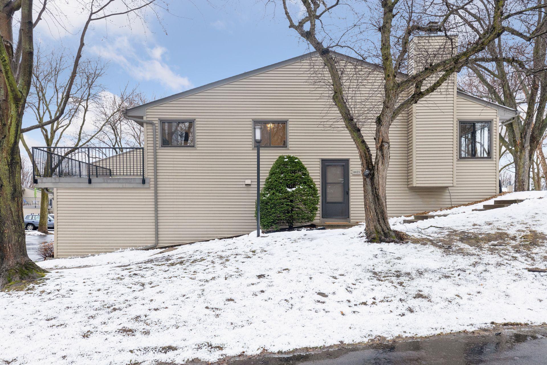 Side perspective showing the front walkway and entrance.