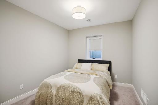 Bedroom #5- Now features new flooring perfect for a workout room