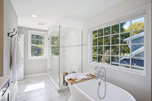 Primary Bath Featuring Dual Sinks, Soaking Tub and Large Walk-in Shower