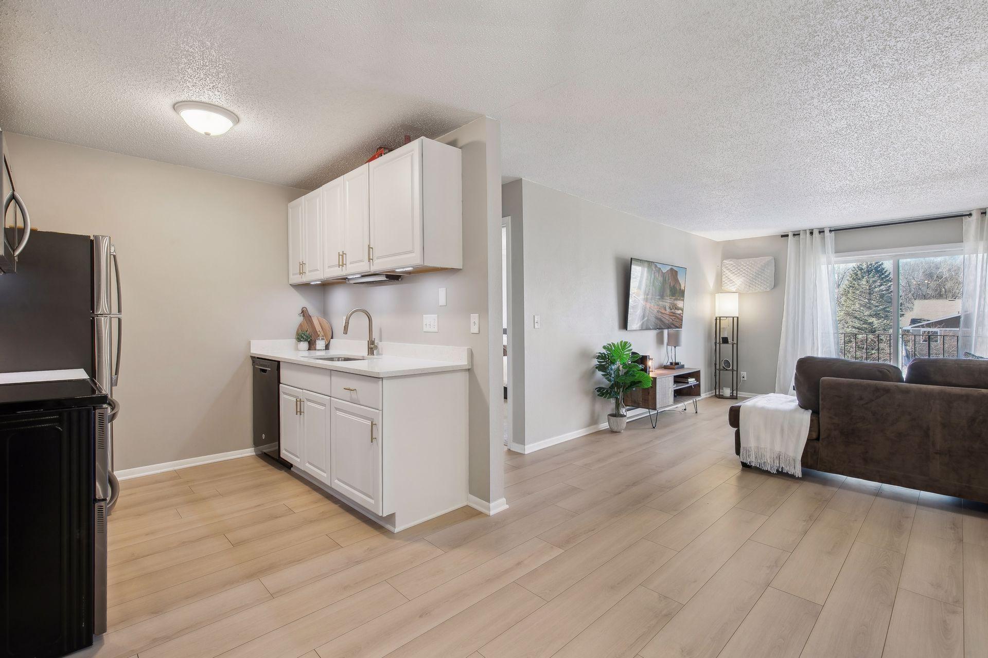 Gourmet kitchen offers all you need! New quartz counters, stainless steel appliances, and plenty of cabinetry