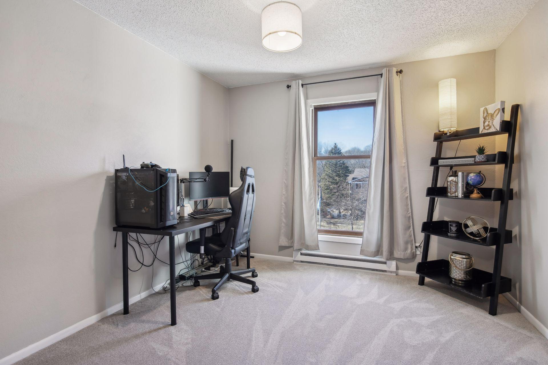 Large second bedroom with fresh paint and carpet large & inviting