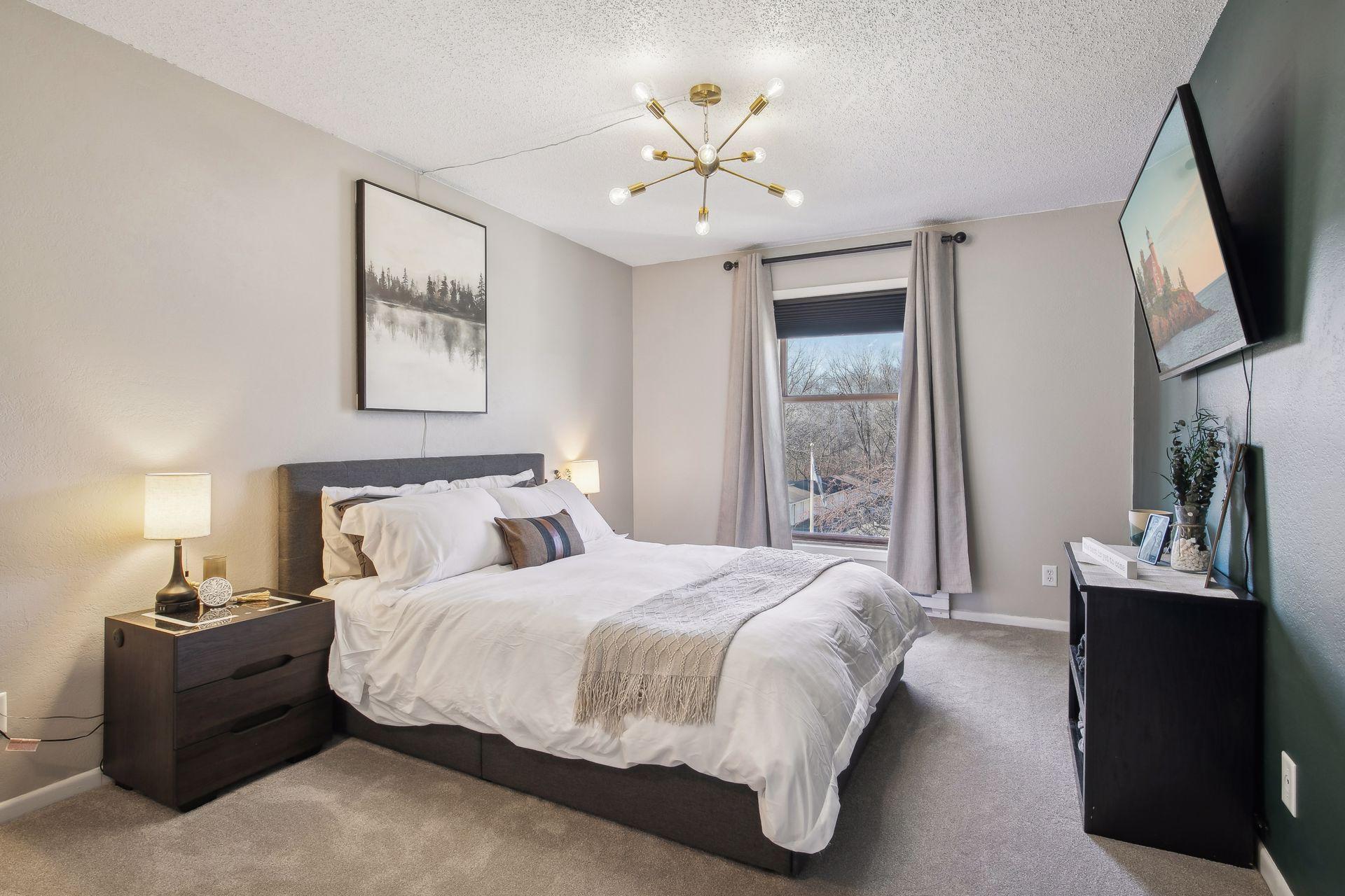 Extra large primary bedroom offers loads of space and fresh carpet! Double closet and private ensuite full bath