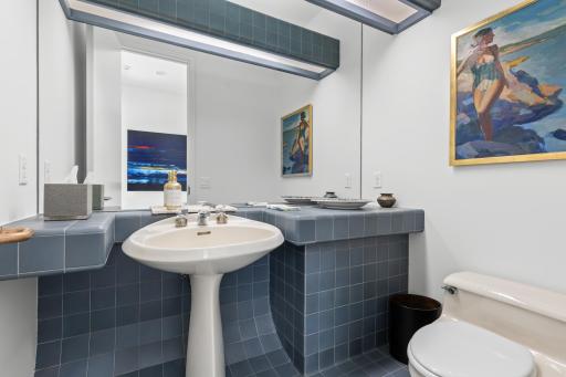 Powder room with grace and sculptural interest