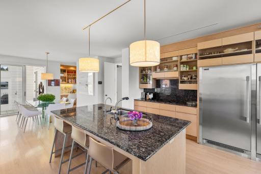 Kitchen with clean lines and light filled working spaces - easily transitions to formal and informal dining