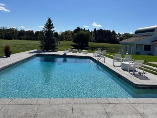 In ground pool designed for beautiful views and especially southern sun light