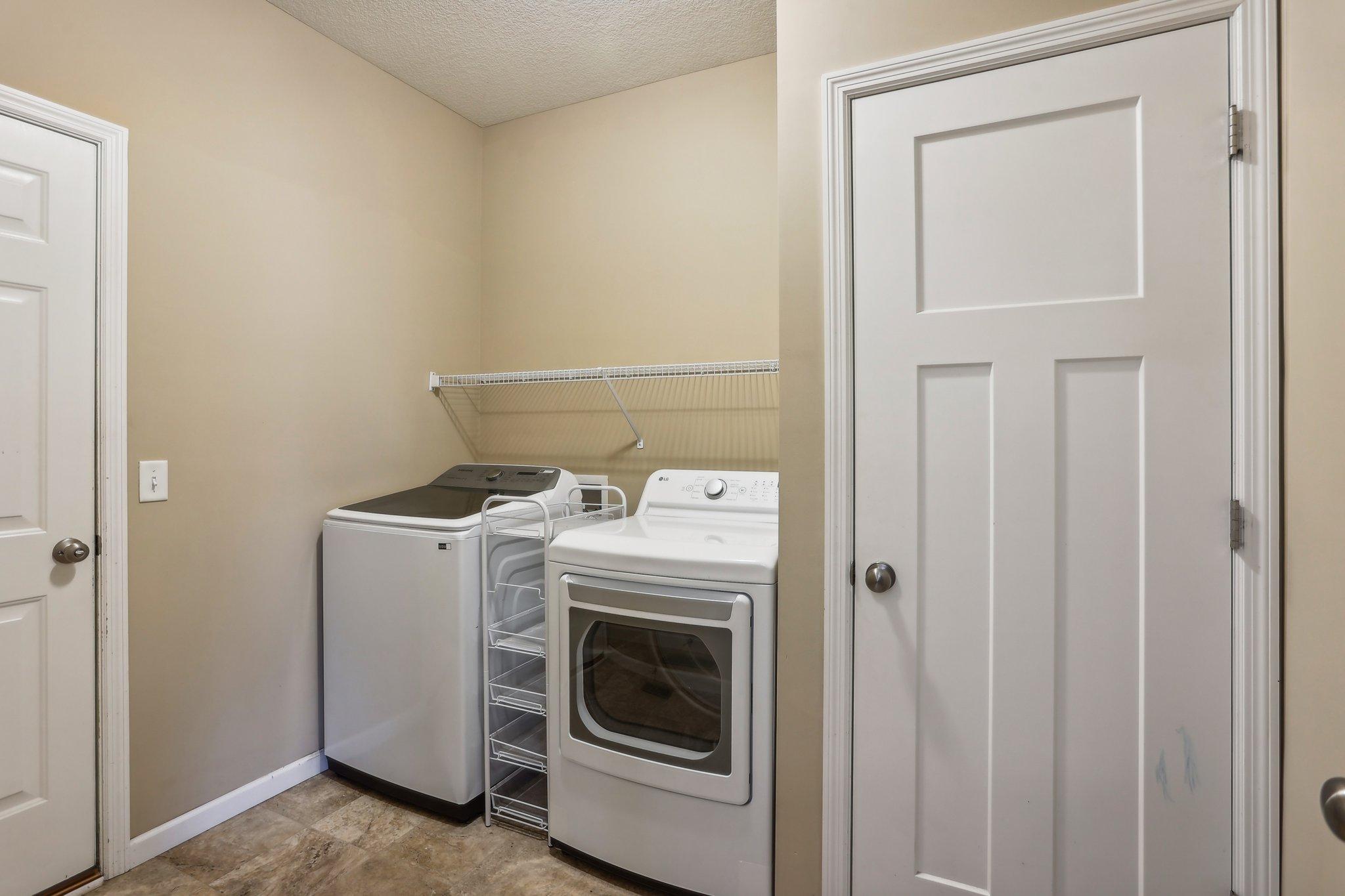 Large Main Level Laundry Off the Garage w/Coat Closet