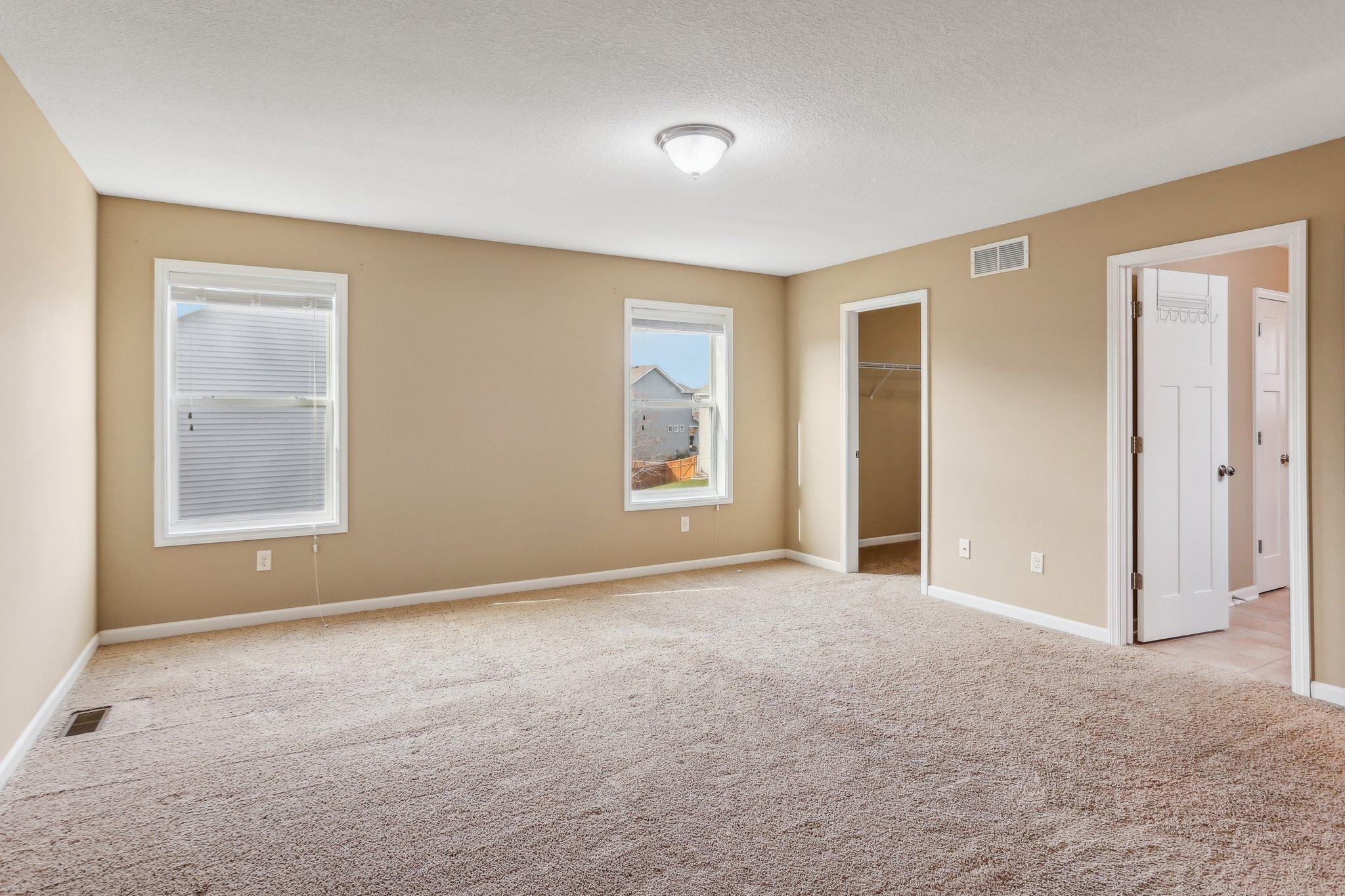 Expansive Primary Suite Bedroom w/Large Walk-In Closet