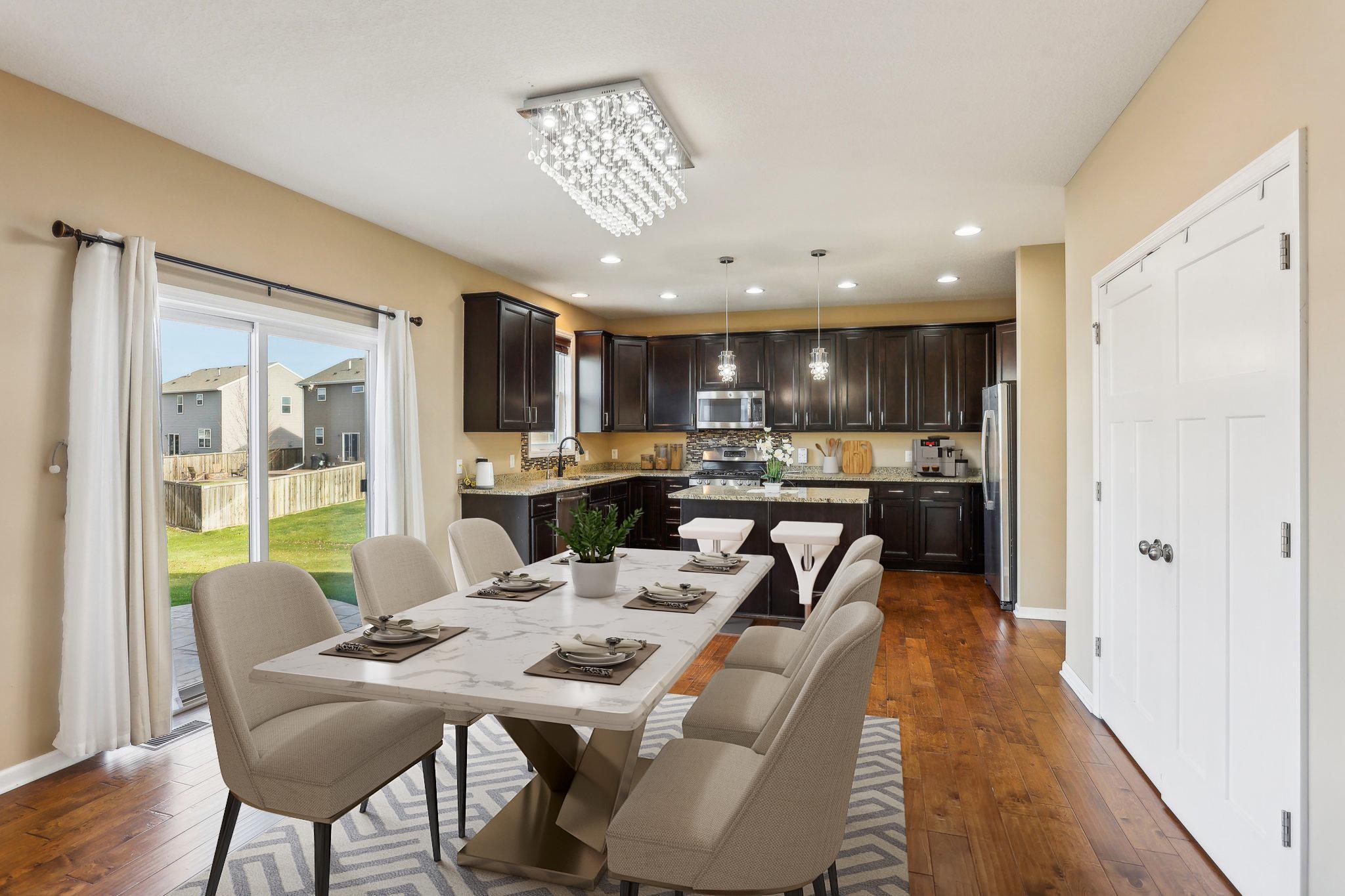 Dining Area and Kitchen - Virtually Staged