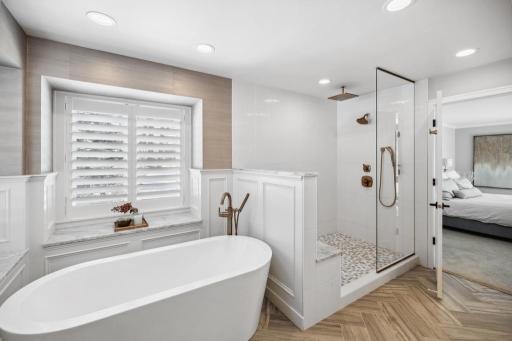 The freestanding soaking tub offers the perfect setting for relaxation, whether youâre immersed in a good book or savoring a glass of wine.