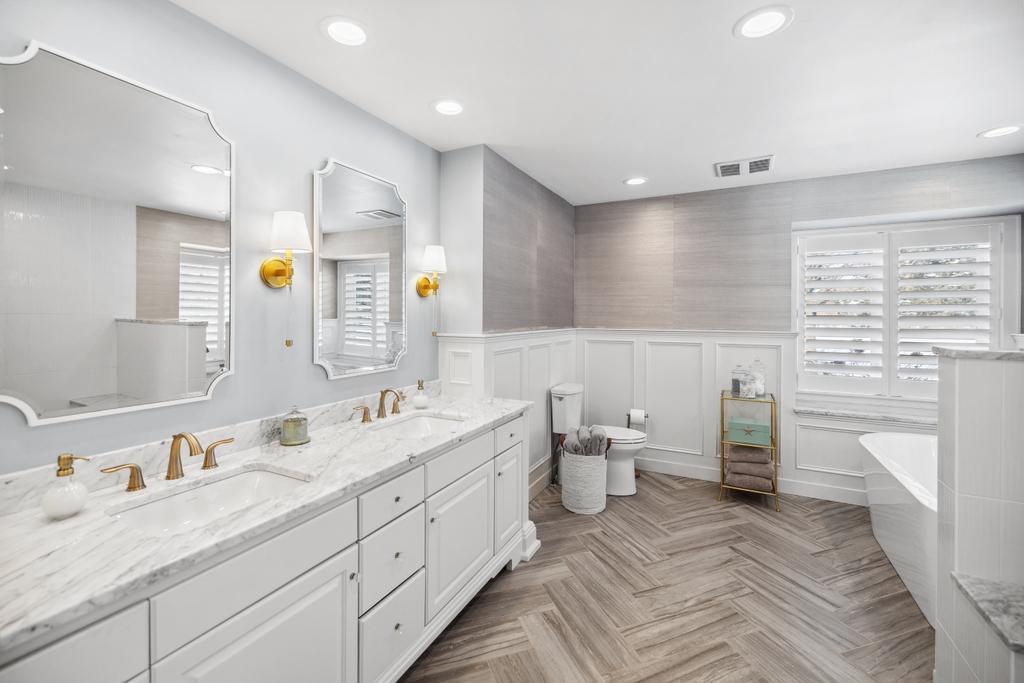 Heated floors welcome you as you step into the en-suite bathroom, where every detail is designed to create a spa-like experience.