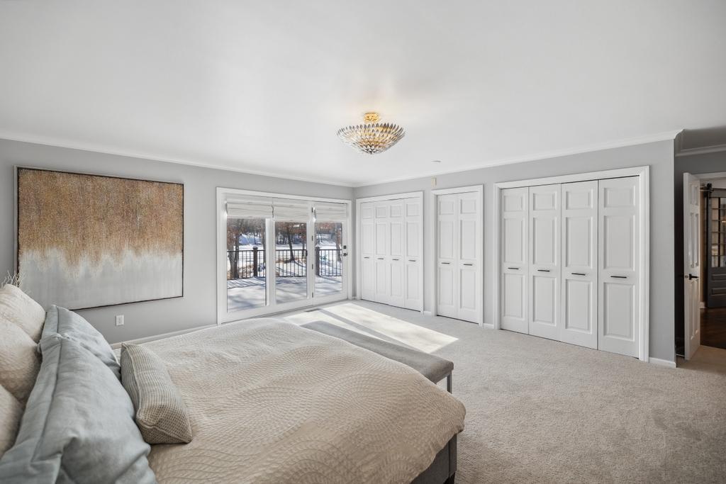 A sliding door opens to a private deck, ideal for enjoying your morning coffee or a leisurely weekend breakfast.