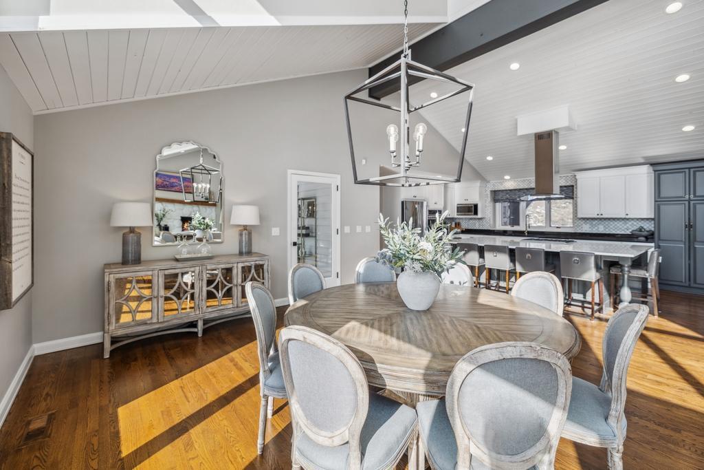 The dining room is where natural light and stunning lake views combine to create a truly captivating space.