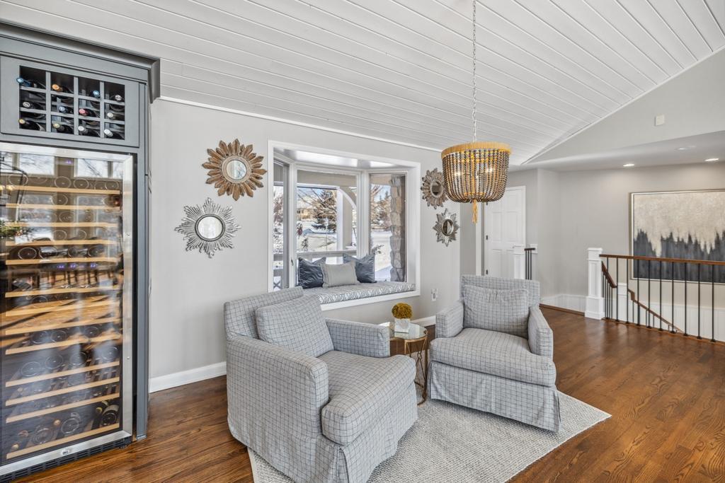 A built-in Lanbo wine refrigerator invites you to uncork your favorite bottle as you relax after dinner.