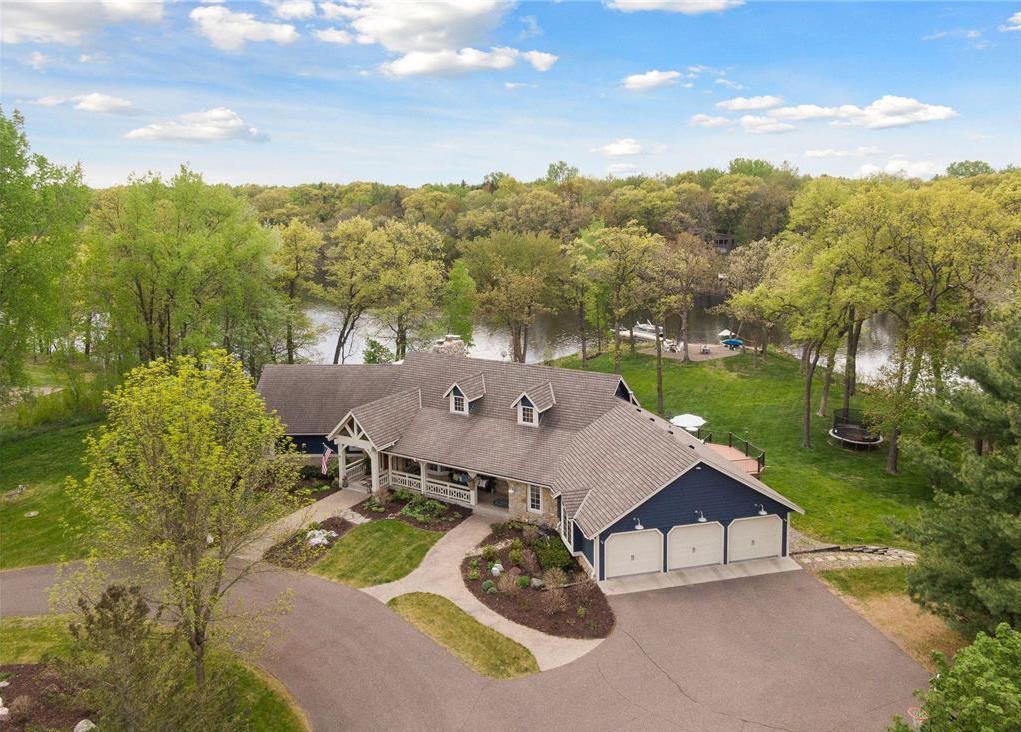 This home sits on nearly 4 private acres in Mahtomedi and offers 400 feet of lakeshore on Long Lake.