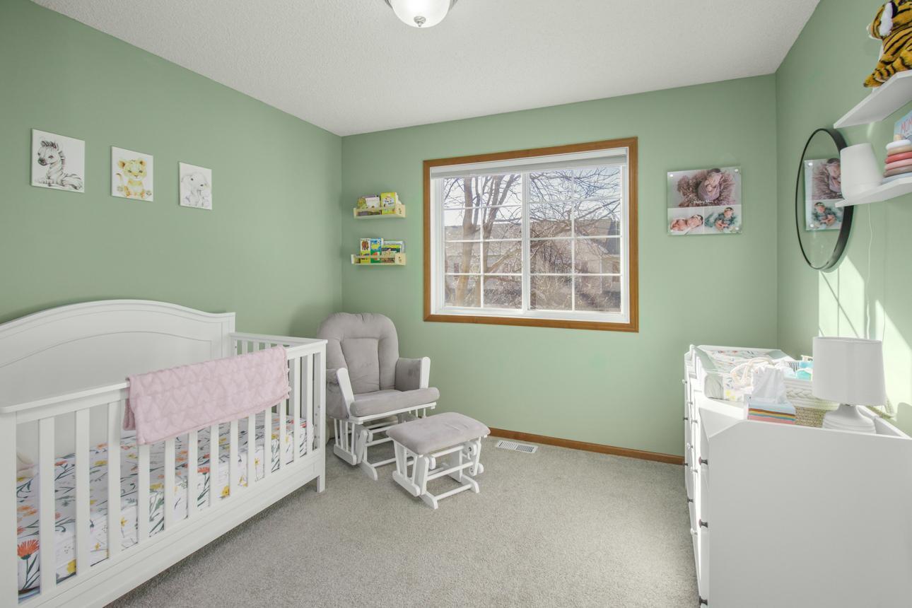 Bedroom three of three on the upper is also spacious and well lit!