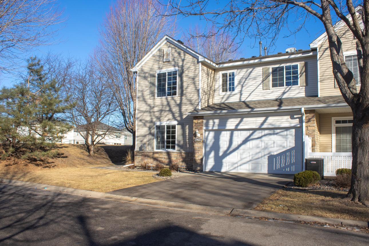 Impeccable three bedroom, end unit townhome in Charleswood Crossing! Private location within the community offers greenspace and quiet.