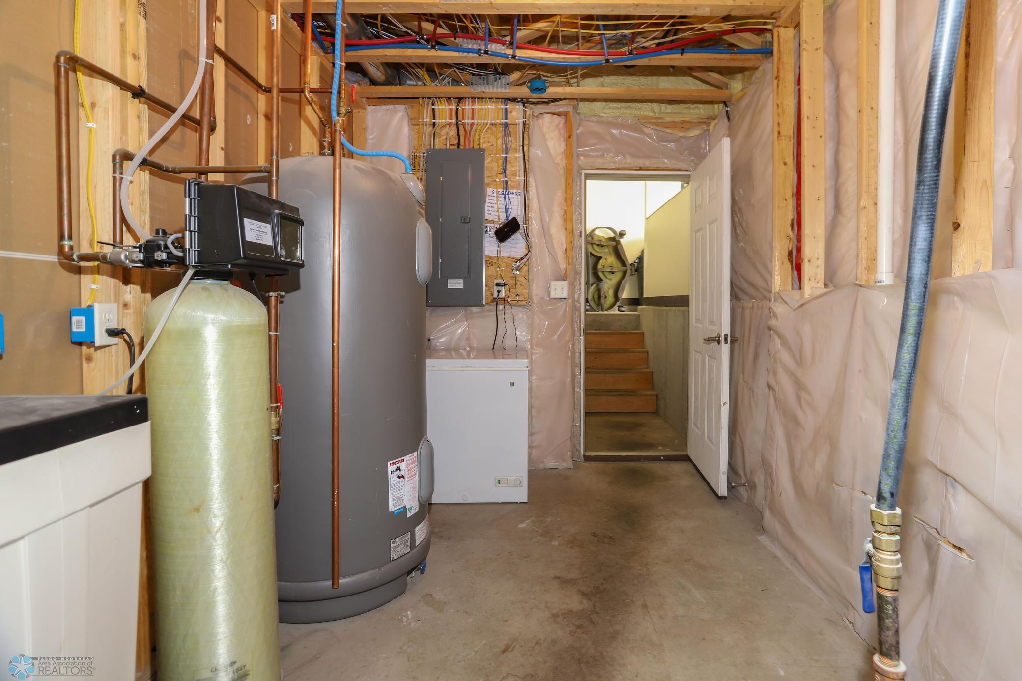 utility room with walk out to garage