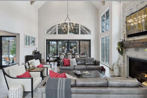 Great room and dining area looking onto screen porch
