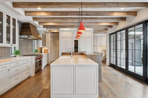 Large center island featuring Cambria tops