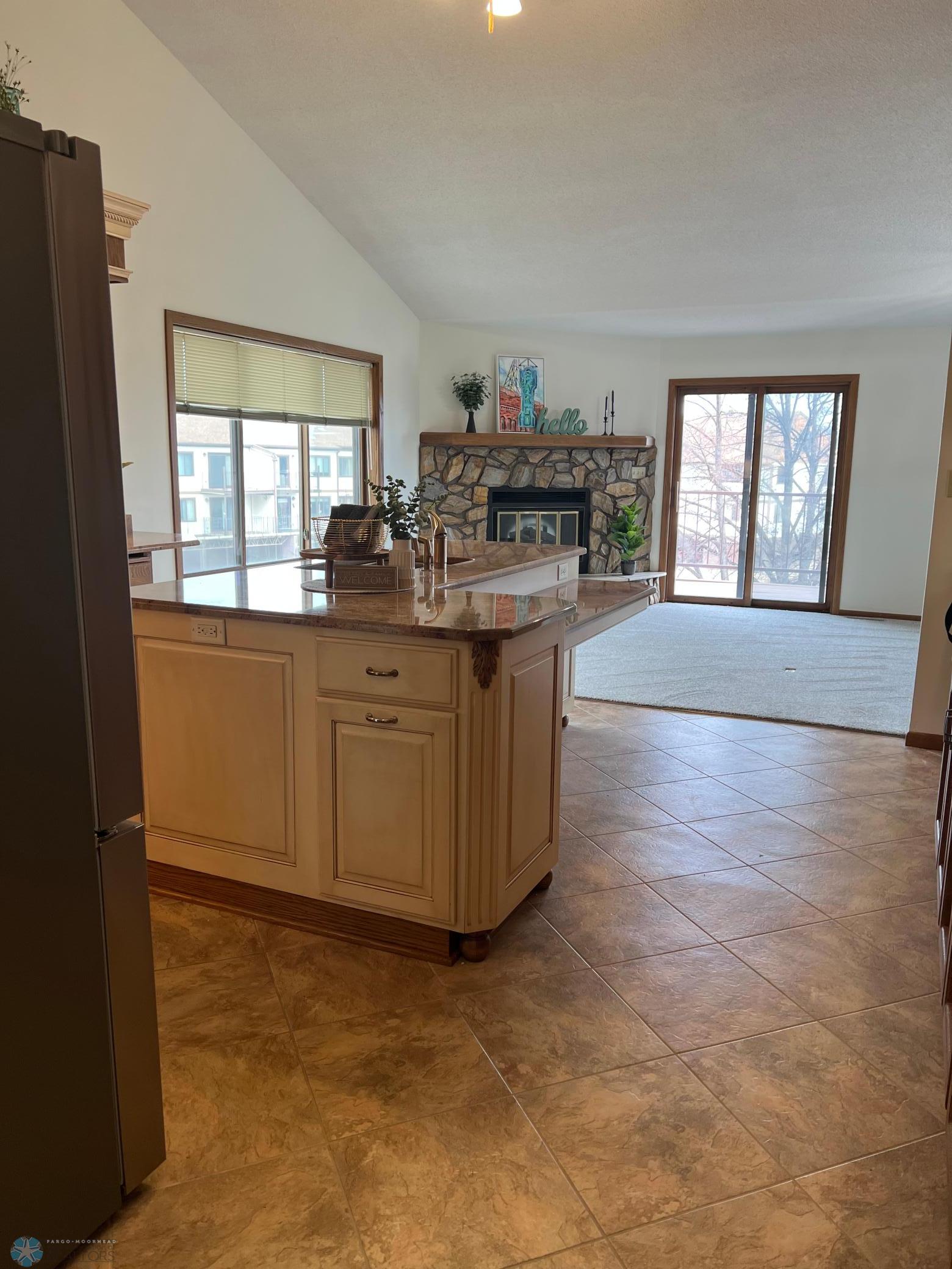 Kitchen view into sitting area
