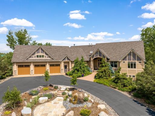 Custom built Koestering & Schumacher home with stunning architecture, timeless design, and incredible curb appeal.