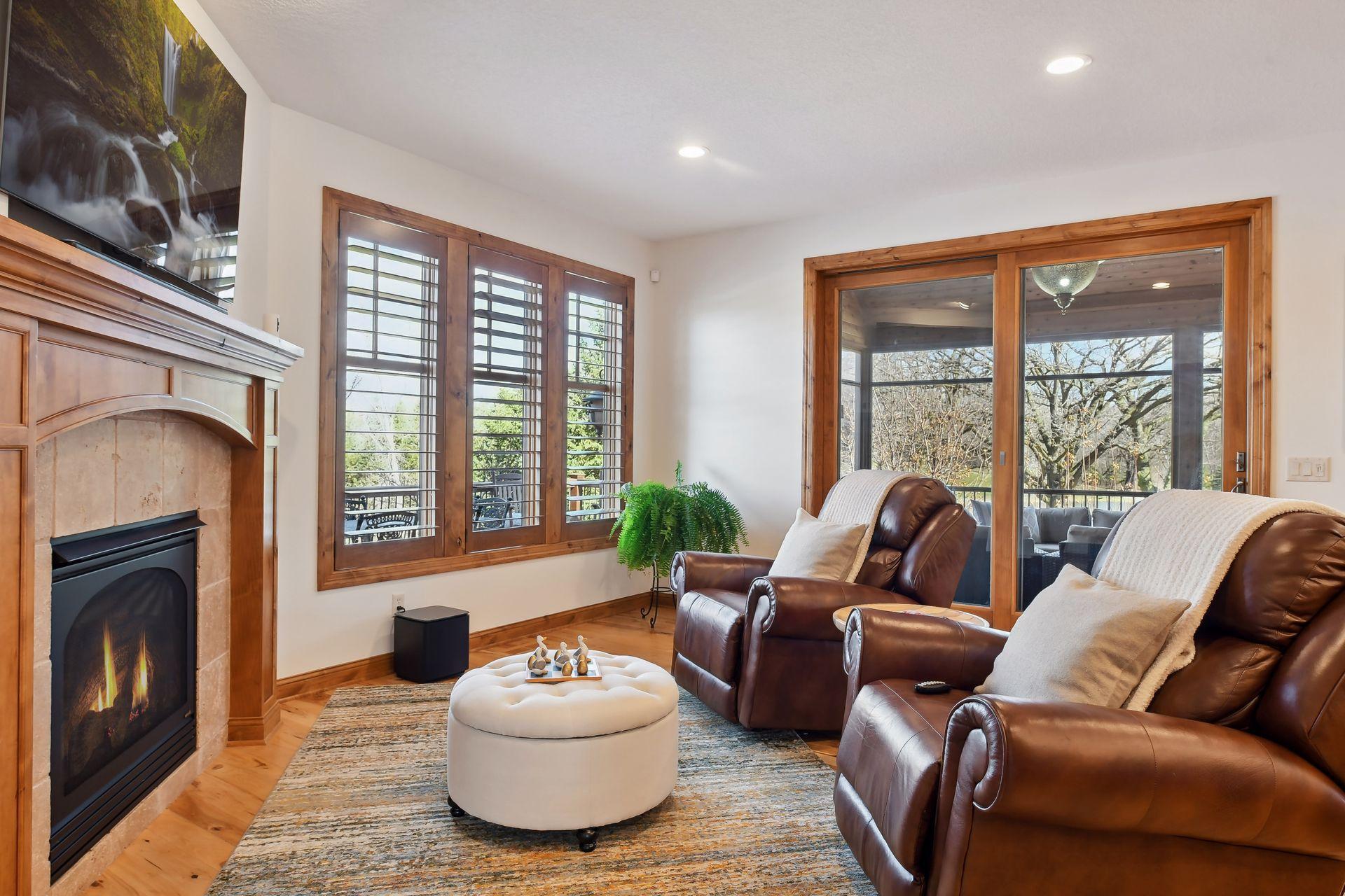 Additional sitting area situated next to the kitchen with another gas fireplace to enjoy!