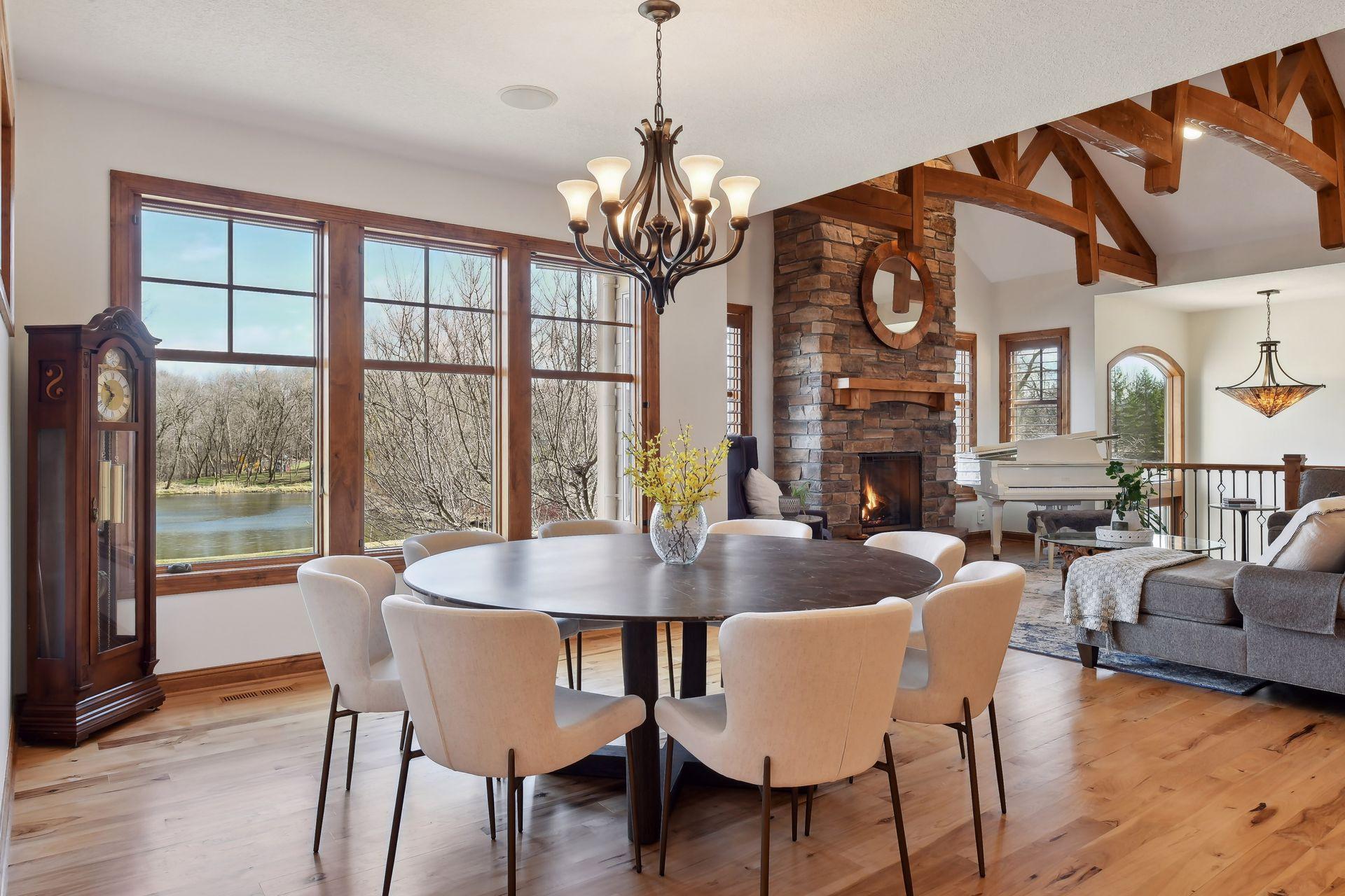 The inviting dining space is well situated in this incredible great room space.