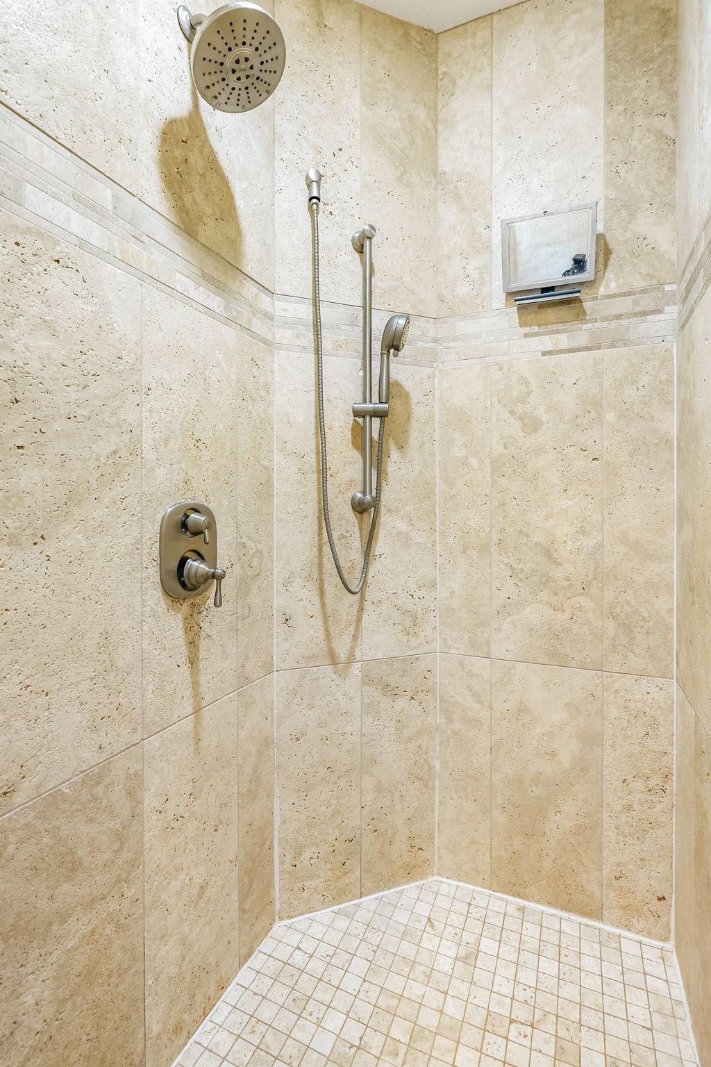 Lovely Travertine tile shower