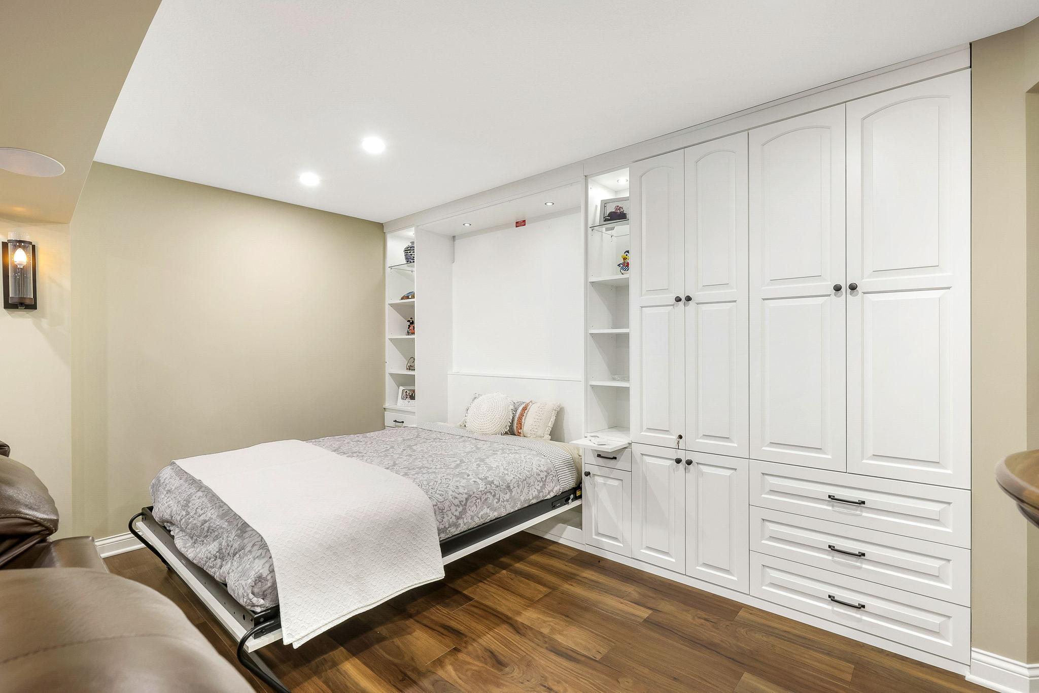 Techline modular built-in storage system and Murphy bed in the Mother-in-Law suite to easily convert space as needed.