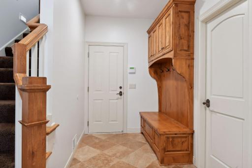 Back entrance through the garage that leads to the main floor kitchen/great room area and Upper level 4th bedroom/bonus room.