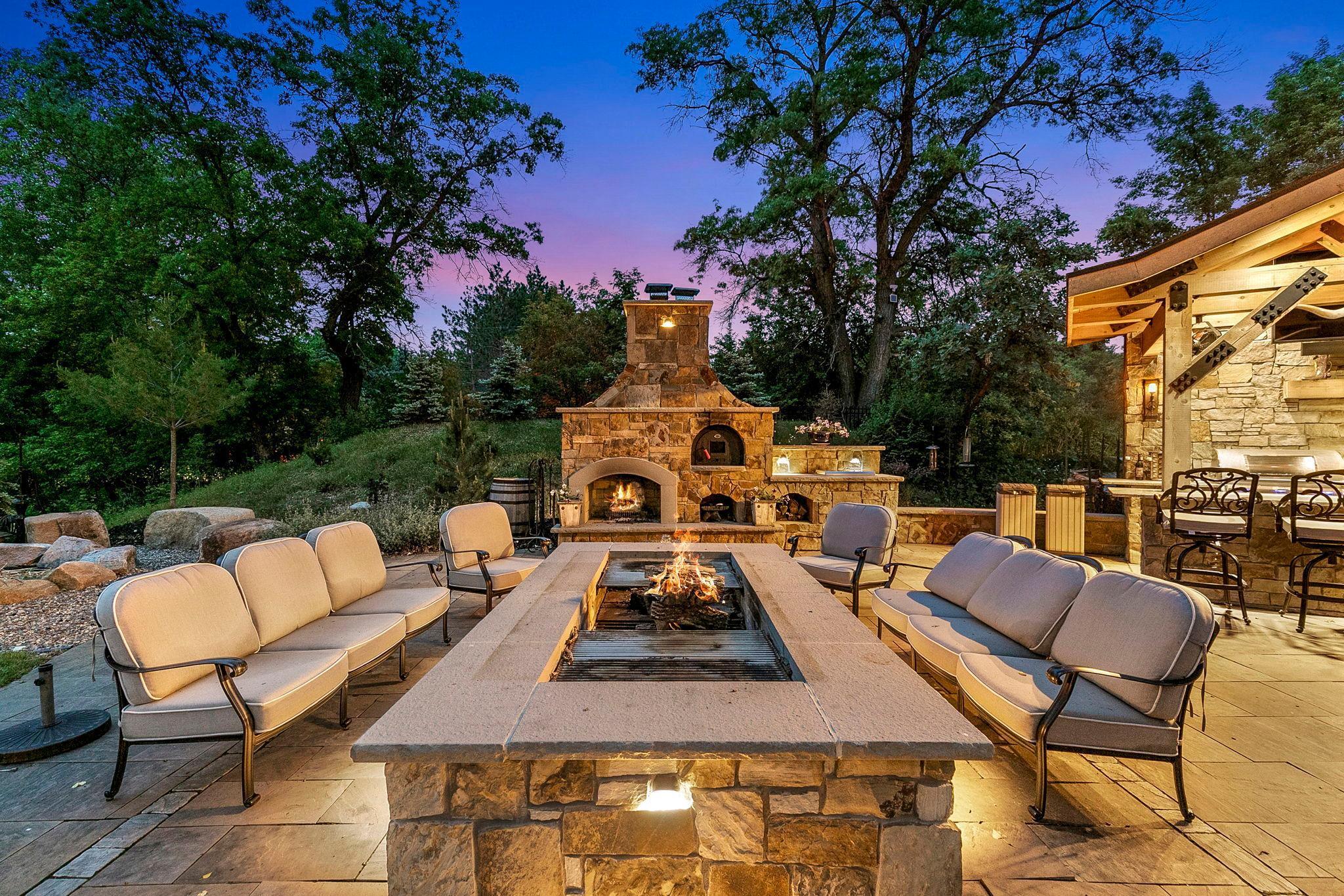 Imagine sitting here with your friends and family and enjoying this incredible space - either relaxing with a glass of wine or dining at this one of a kind fire table/cooking table.