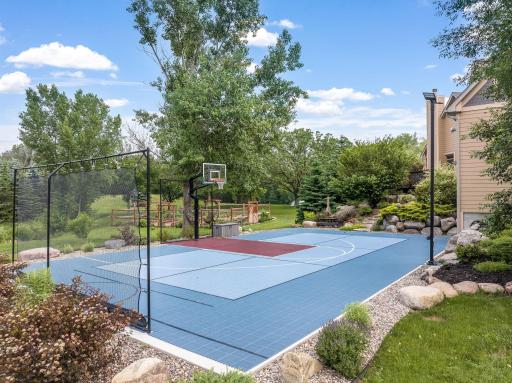 Incredible Sports Court with stadium lighting was built with all top of the line materials.