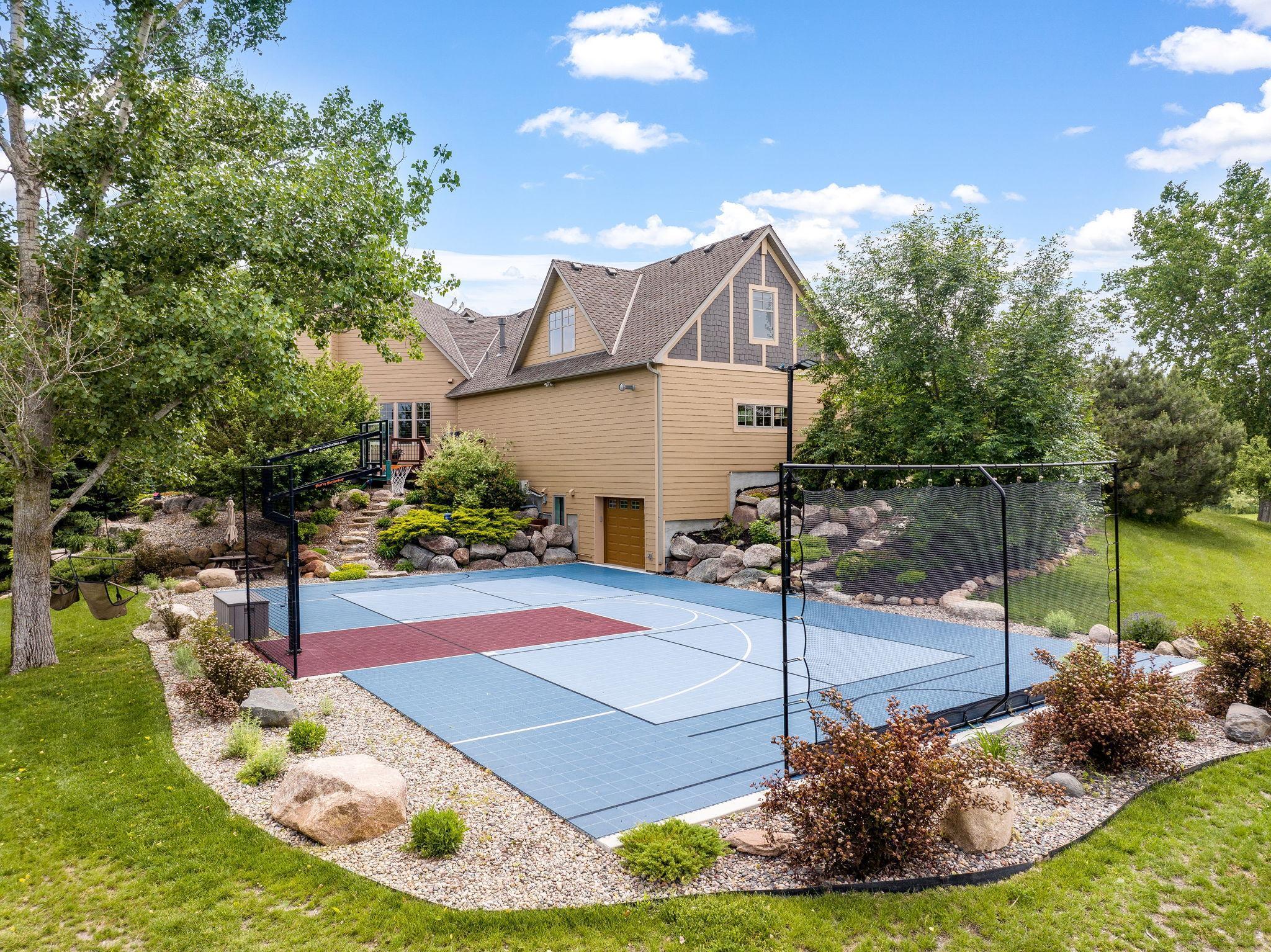 asketball/regulation Pickle Ball Sports court with soccer/lacrosse rebounder net and stadium lighting