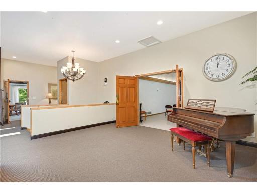 This picture shows the entry ,the stairs to the lower level, and one of the entries to the private living quarters.