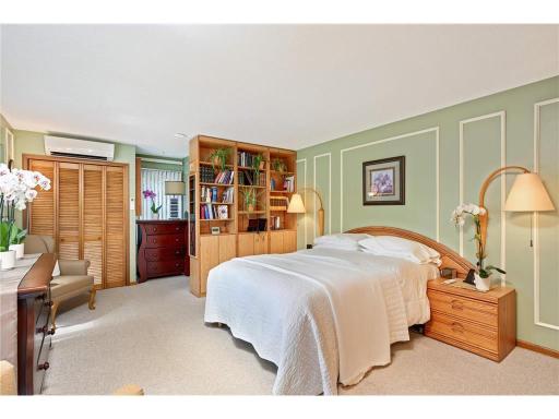 The primary bedroom suite on the main level