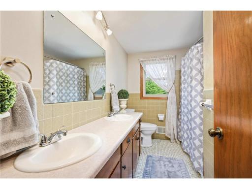 This is the upper level full bath with two sinks